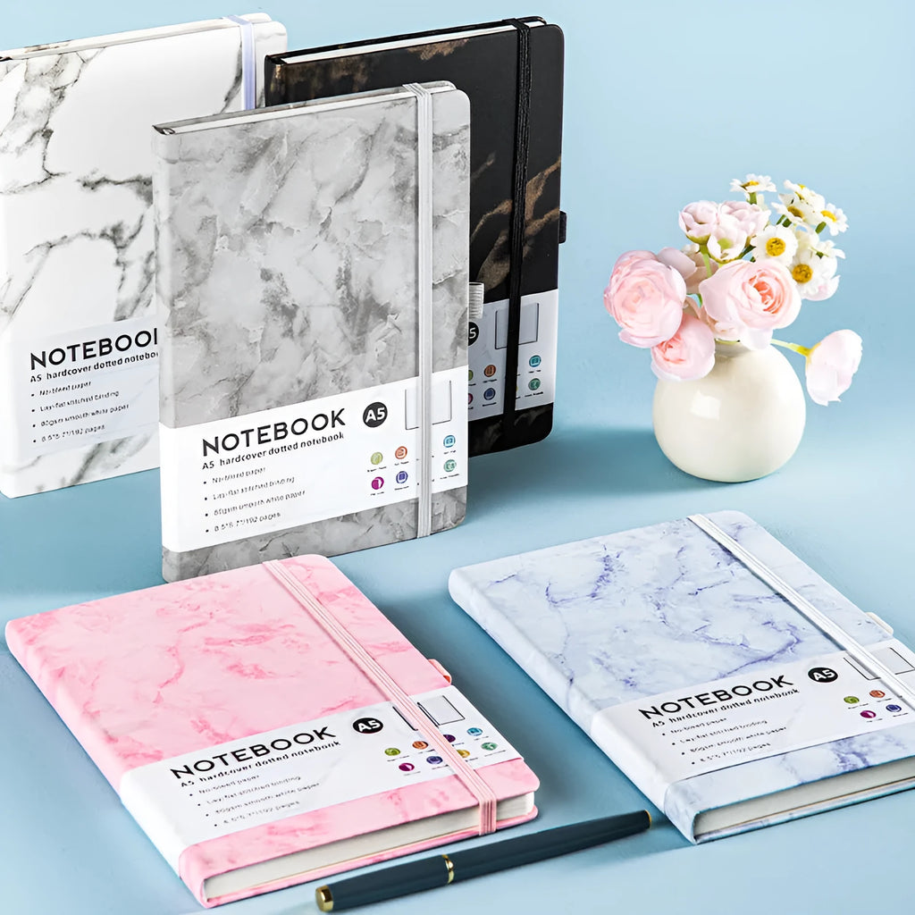 A5 skin-feel PU leather strap diary notebook open on horizontal line pages