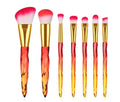 Set of ten clear crystal-handled foundation brushes with synthetic bristles in a choice of colours.