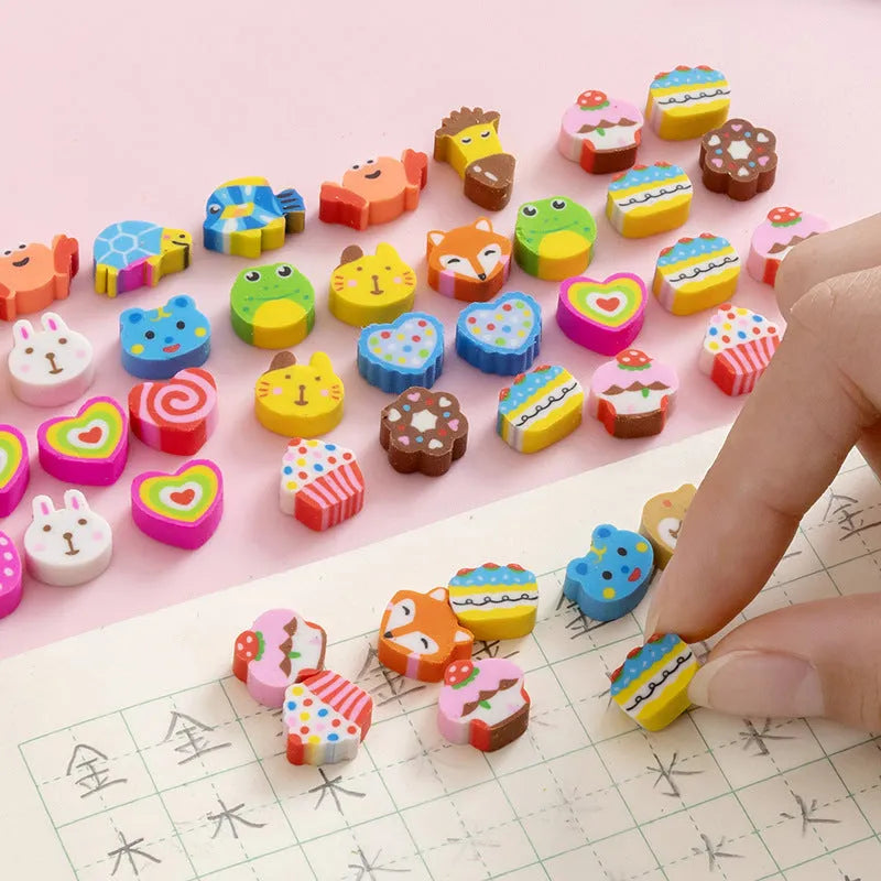 Assortment of 50 small colourful cartoon fruit and animal themed TPR rubber mini erasers.