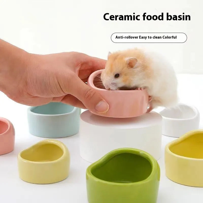 Small ceramic hamster food bowl in blue with a simple round basin design