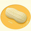 Yellow peanut-shaped dog chew toy with textured surface for teeth cleaning