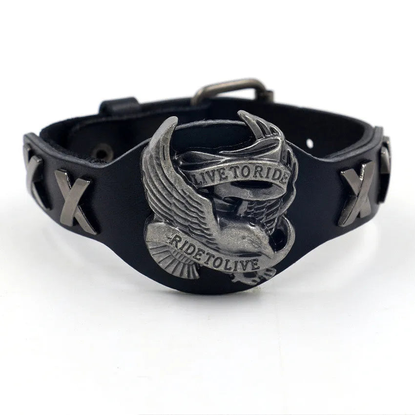 Black leather eagle geometric pattern bracelet with watch-button clasp on wrist