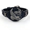 Black leather eagle geometric pattern bracelet with watch-button clasp on wrist