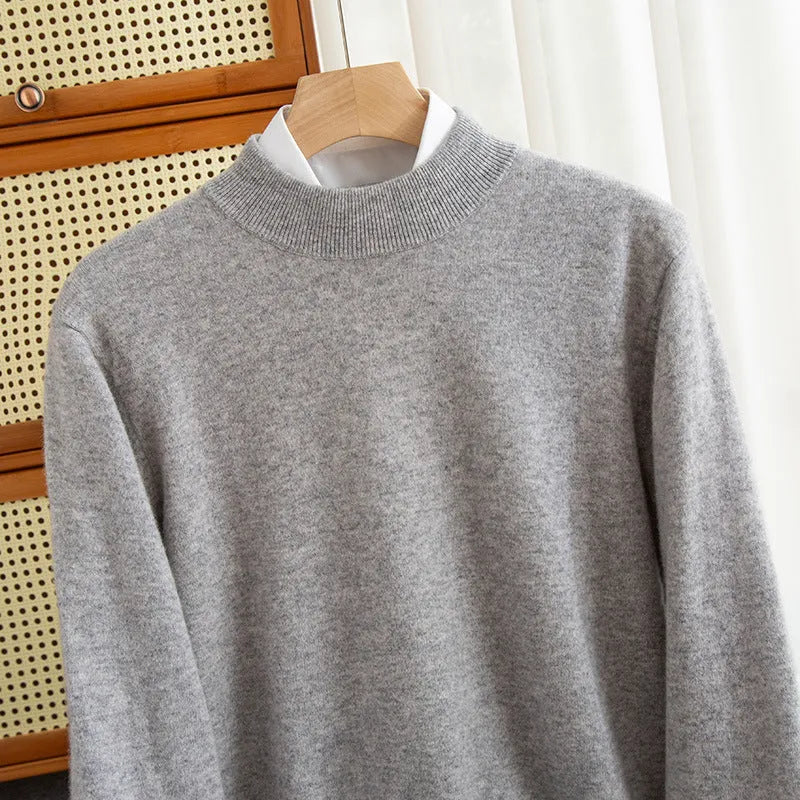 Man wearing a loose-fit half-collar wool sweater in a neutral colour, suitable for winter casual wear.