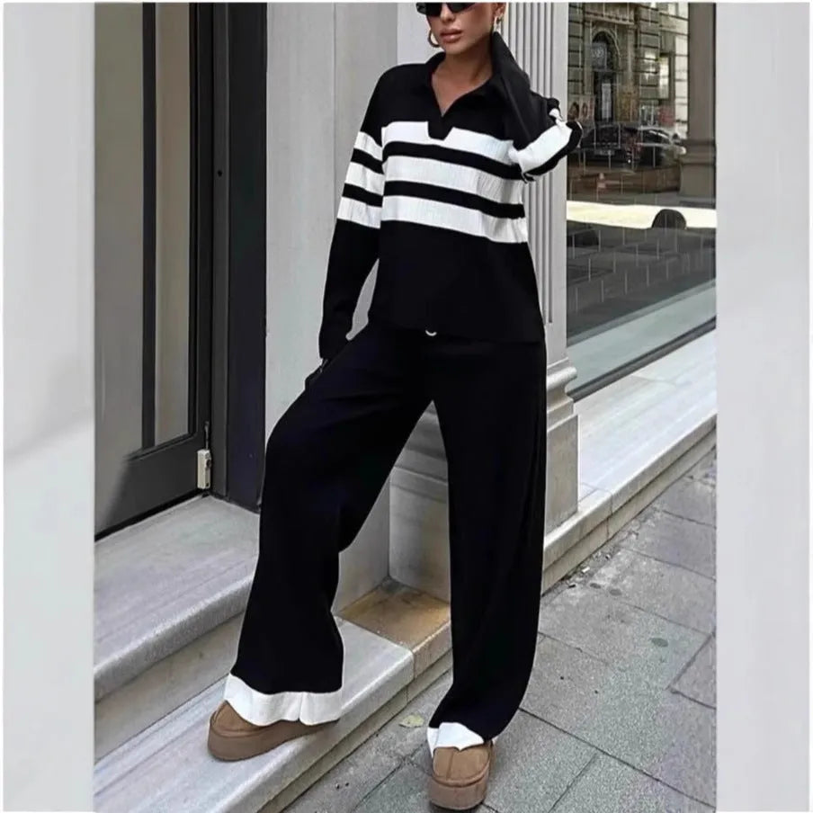 Women's black and white striped polo collar knit two-piece set with matching trousers