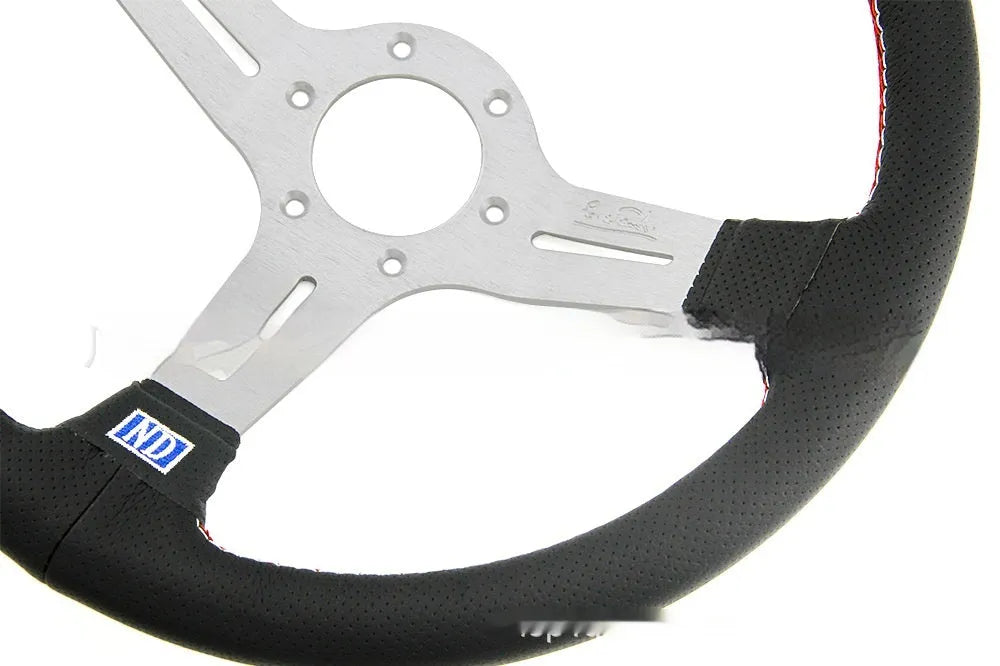 14-inch leather steering wheel with concave middle section in silver-black colour