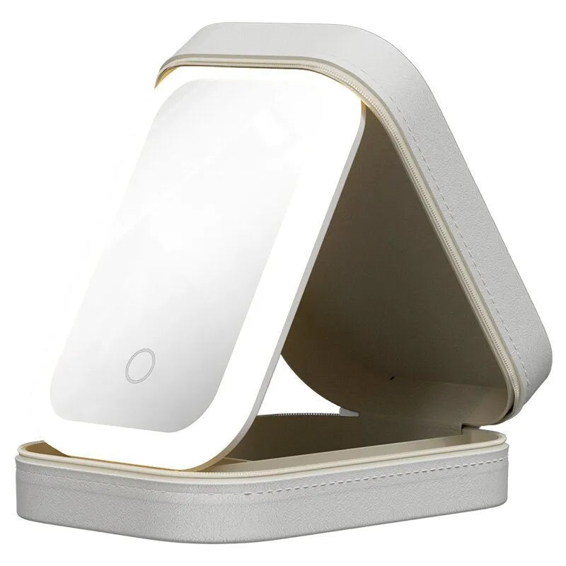 Portable LED light makeup mirror with open storage box in Cherry Blossom Pink.