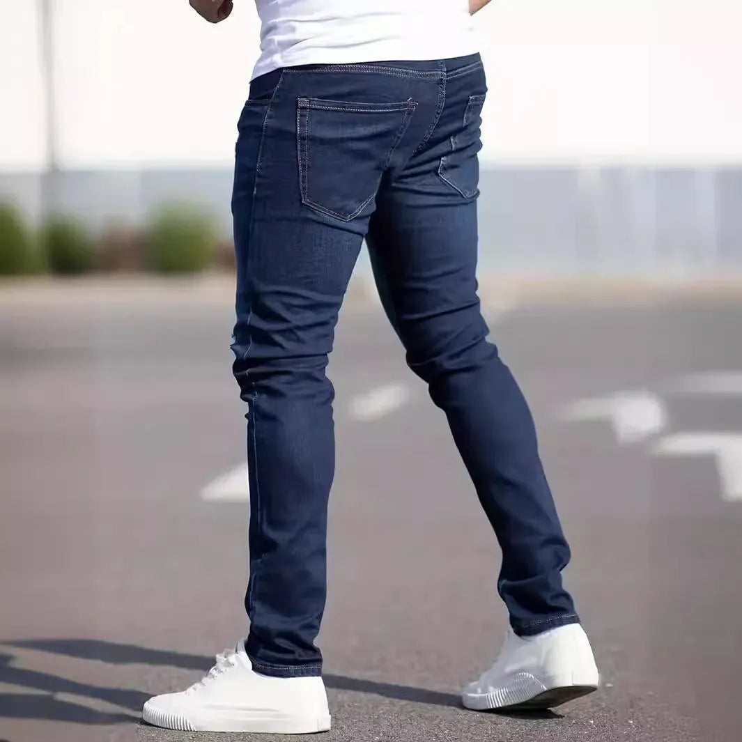 Men's slim-fit dark blue casual jeans with a worn wash and medium elastic cotton fabric.