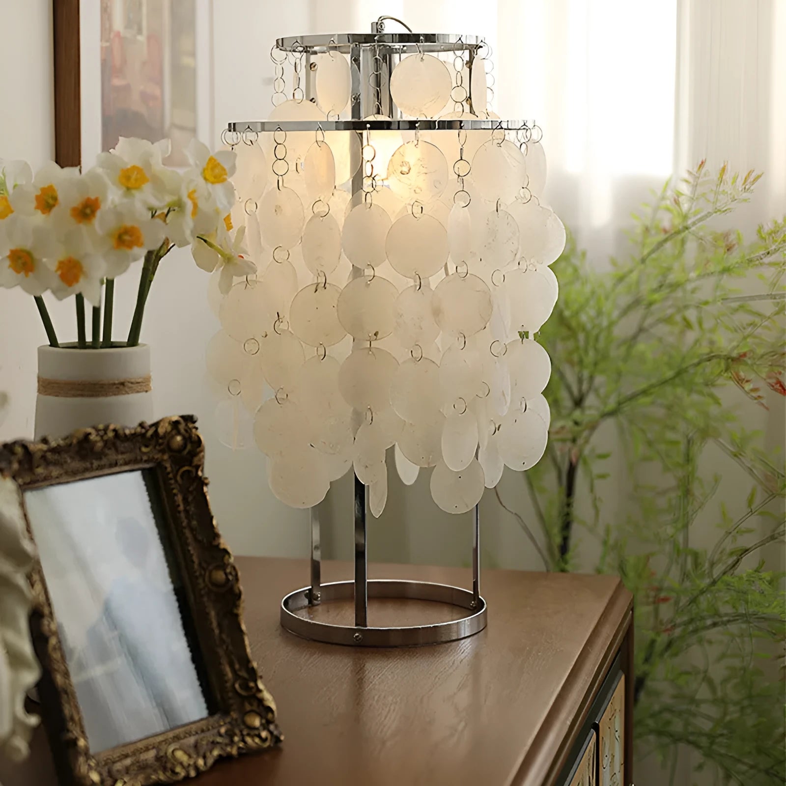 Shell design bedside table lamp in chrome or gold finish with modern simplicity styling
