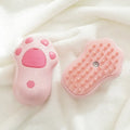 Cat paw style USB rechargeable pet spray massage brush on white background, compact ABS plastic grooming tool