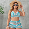 Blue women's swimsuit with hollow out straps and briefs on a mannequin