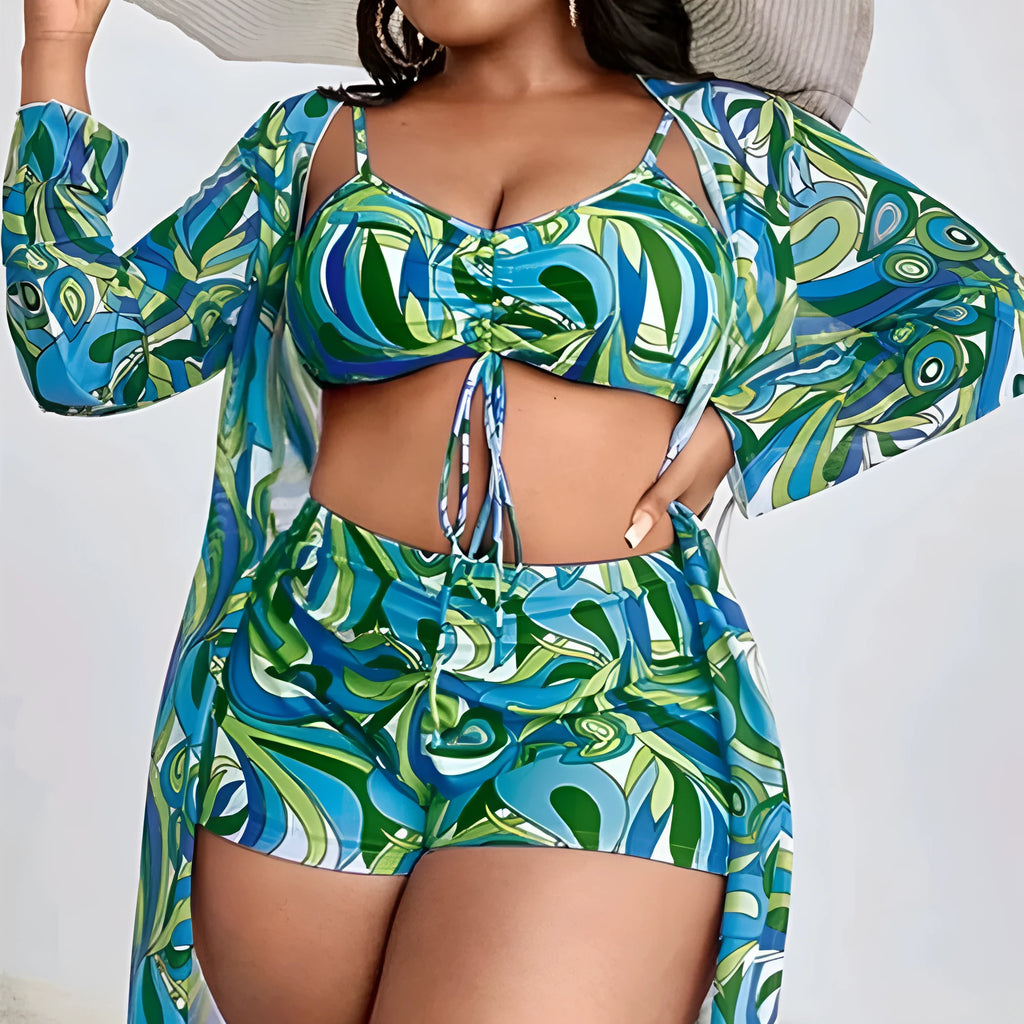 Women's floral print bikini three-piece set with bra, briefs, and cardigan cover-up.