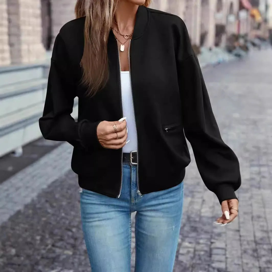 Women's solid black faux pocket zip jacket with long sleeves for casual autumn winter wear