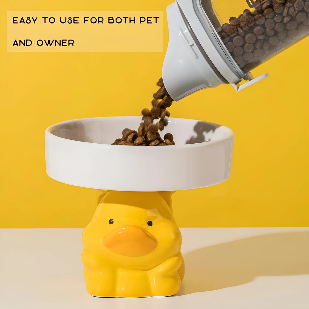 Ceramic raised cat bowl with animal design, showing elevated height and wide feeding opening