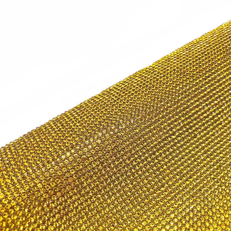 Sheet of rhinestones on adhesive net with hot drill glue backing in assorted colours.