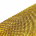 Sheet of rhinestones on adhesive net with hot drill glue backing in assorted colours.