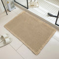 Square checkered pattern non-slip bathroom floor carpet on a tiled floor