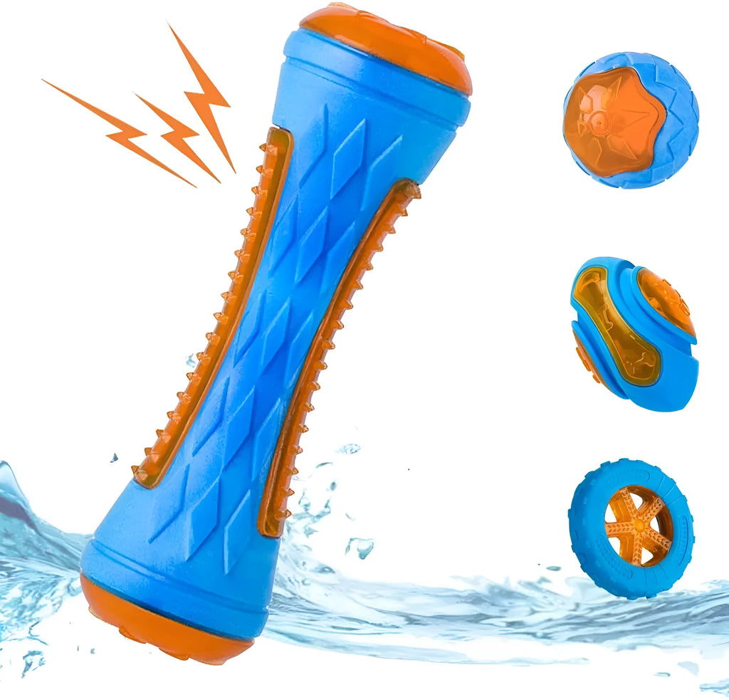 Three TPR floating dog toys: a red squeaky ball, a blue barbell, and an orange tyre, on a pool edge.