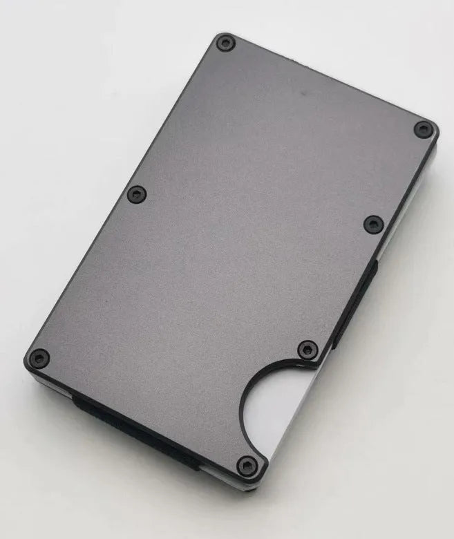 Aluminium alloy grey carbon fibre credit card wallet with RFID blocking, showing seven card slots.