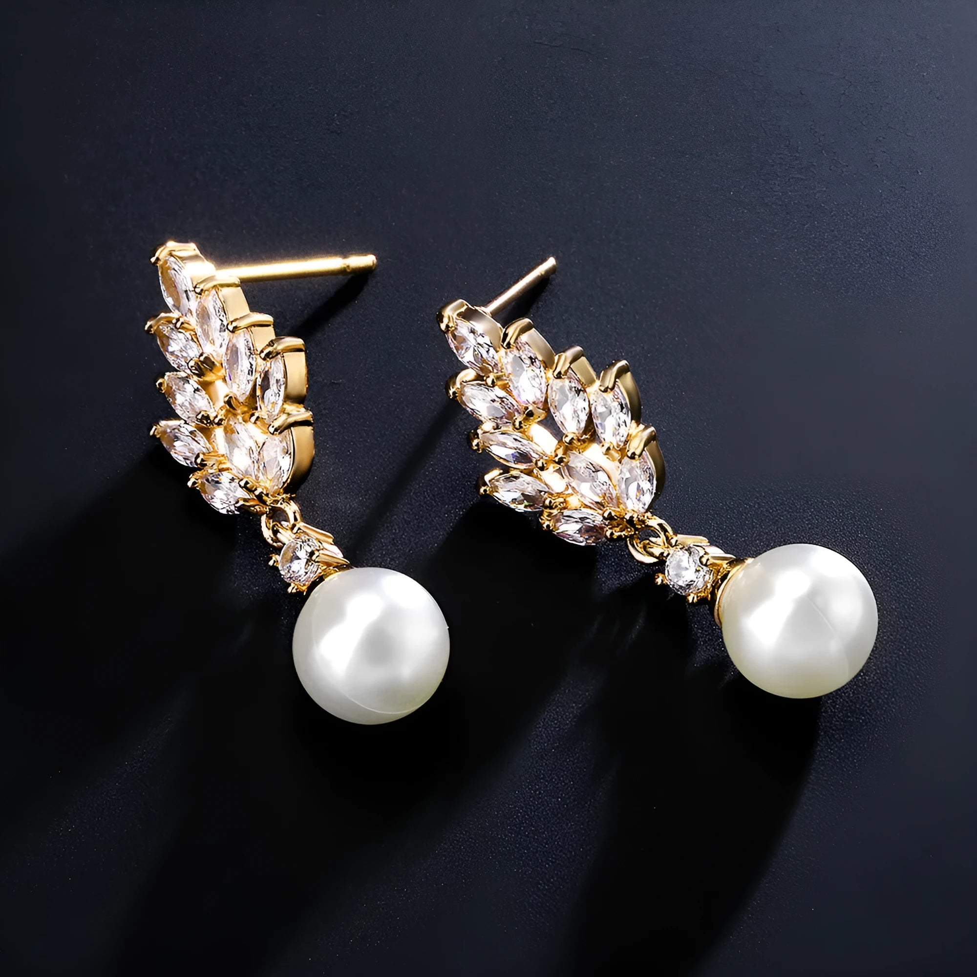 Geometric flower design earrings with micro inlaid zircon and pearl accents in gold, platinum, and rose gold plating.