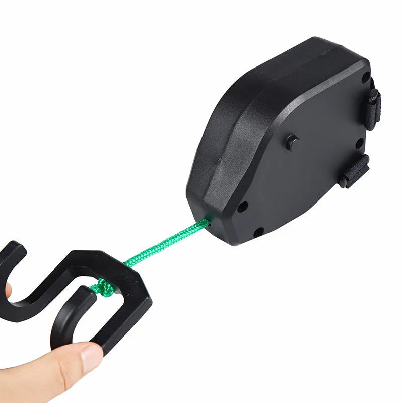 Black plastic bicycle trailer tow rope for connecting bikes to cargo or child trailers.