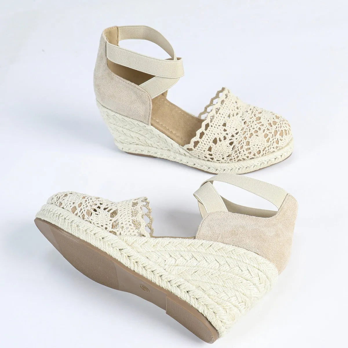 Ladies apricot and black canvas wedge sandals with round toe and Roman style.