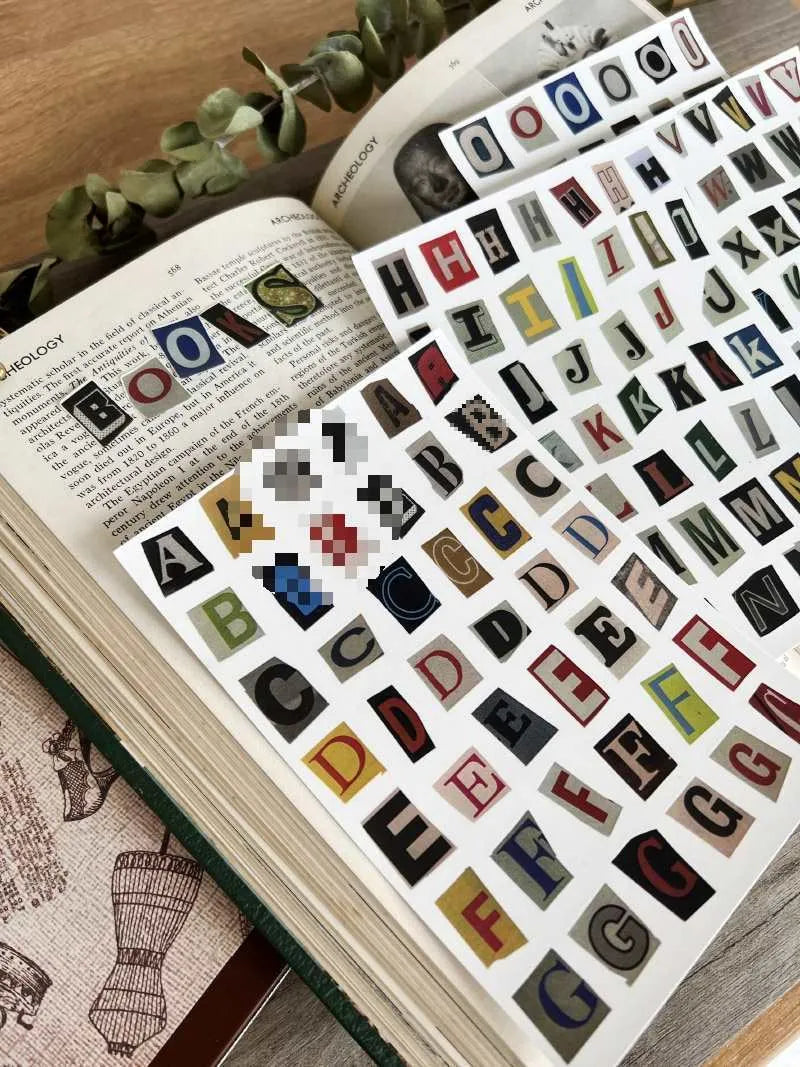 Set of cute style decorative stickers showing English letters, numbers, symbols, and weekly words.