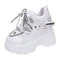 Women's white breathable mesh platform sports shoes with cross strap and 6-8 cm heel.