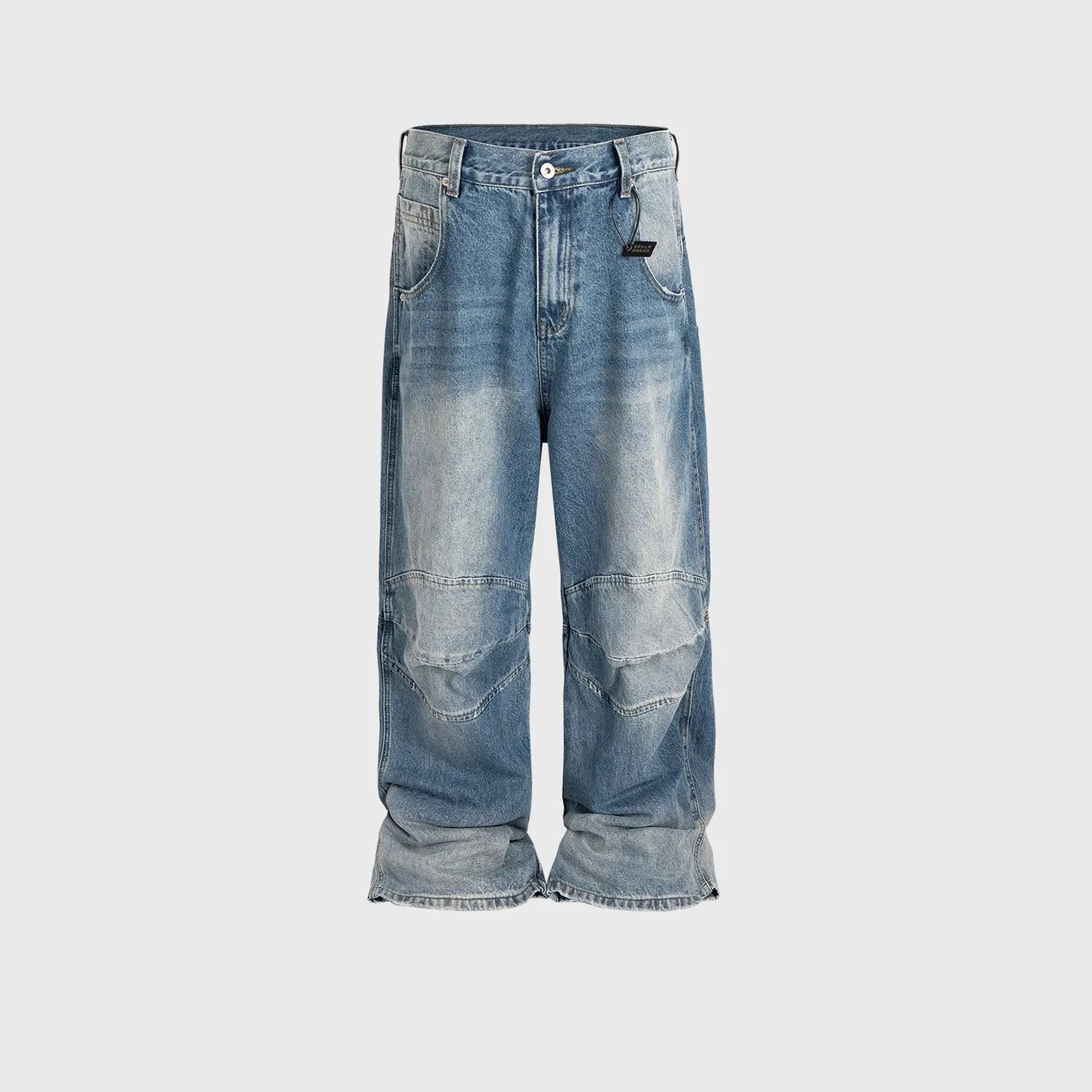 Men's blue white washed denim jeans with baggy cut and straight-leg design showing profile pleating details