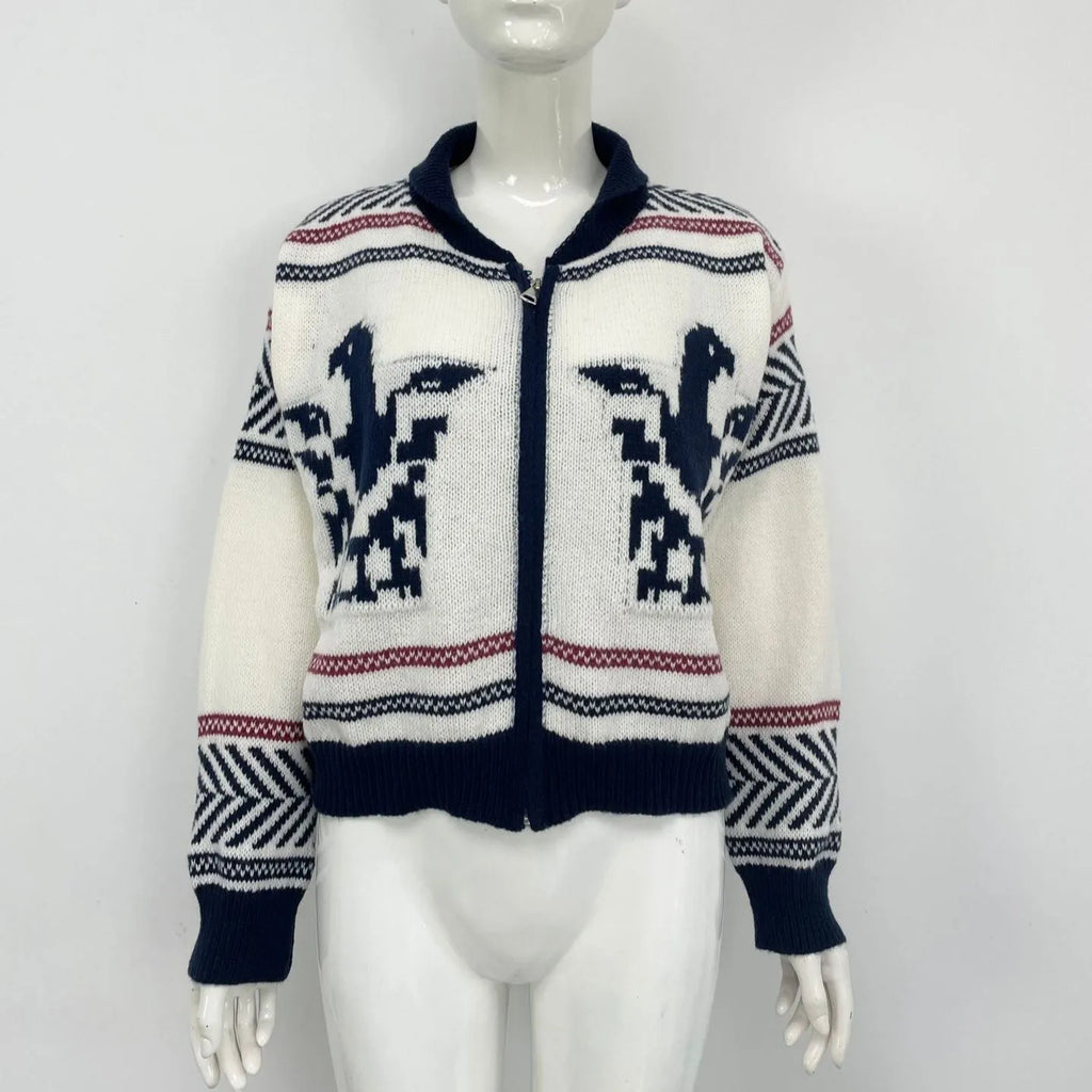 White women's cardigan with front zipper, lapel collar, and jacquard weave pattern