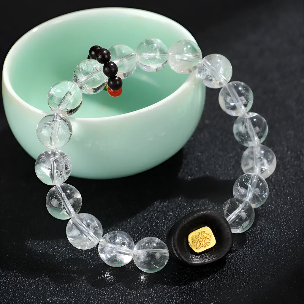 Natural white crystal ebony five warp bracelet on wrist showing handmade ethnic design