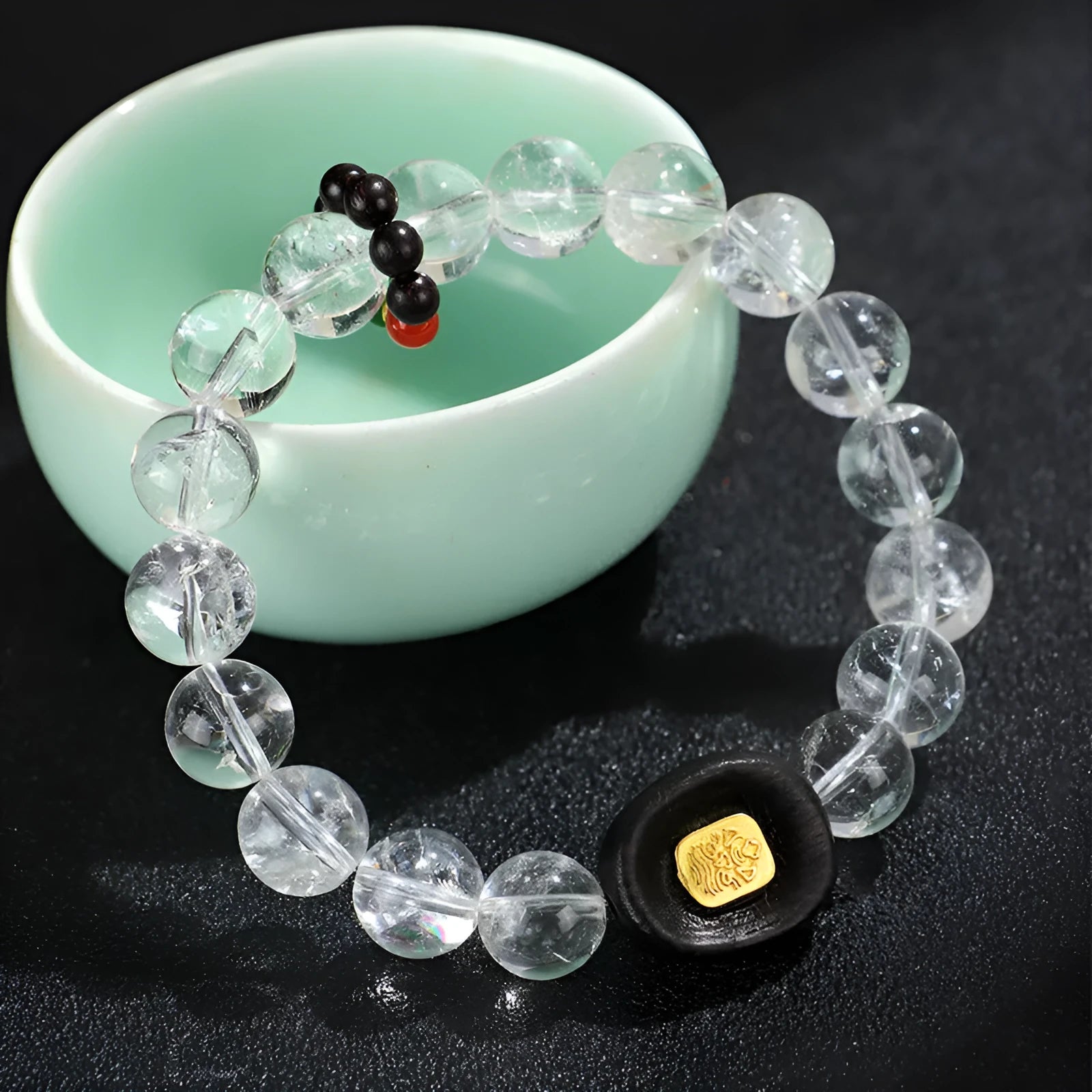 Natural white crystal ebony five warp bracelet on wrist showing handmade ethnic design