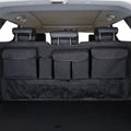 Black car boot hanging storage organiser with waterproof Oxford cloth construction and seat back attachment