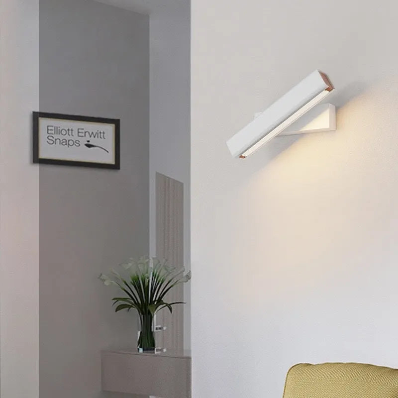 Modern minimalist rotating wall lamp with iron body and PC shade, shown in black or white