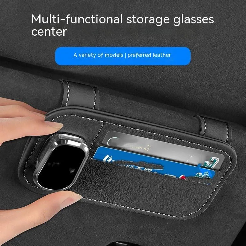 Genuine cowhide leather car sun visor holder with metal sunglasses clip and card storage slots.