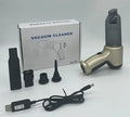 Handheld car vacuum cleaner in gold or silver style with wireless charging capability and pet hair attachment