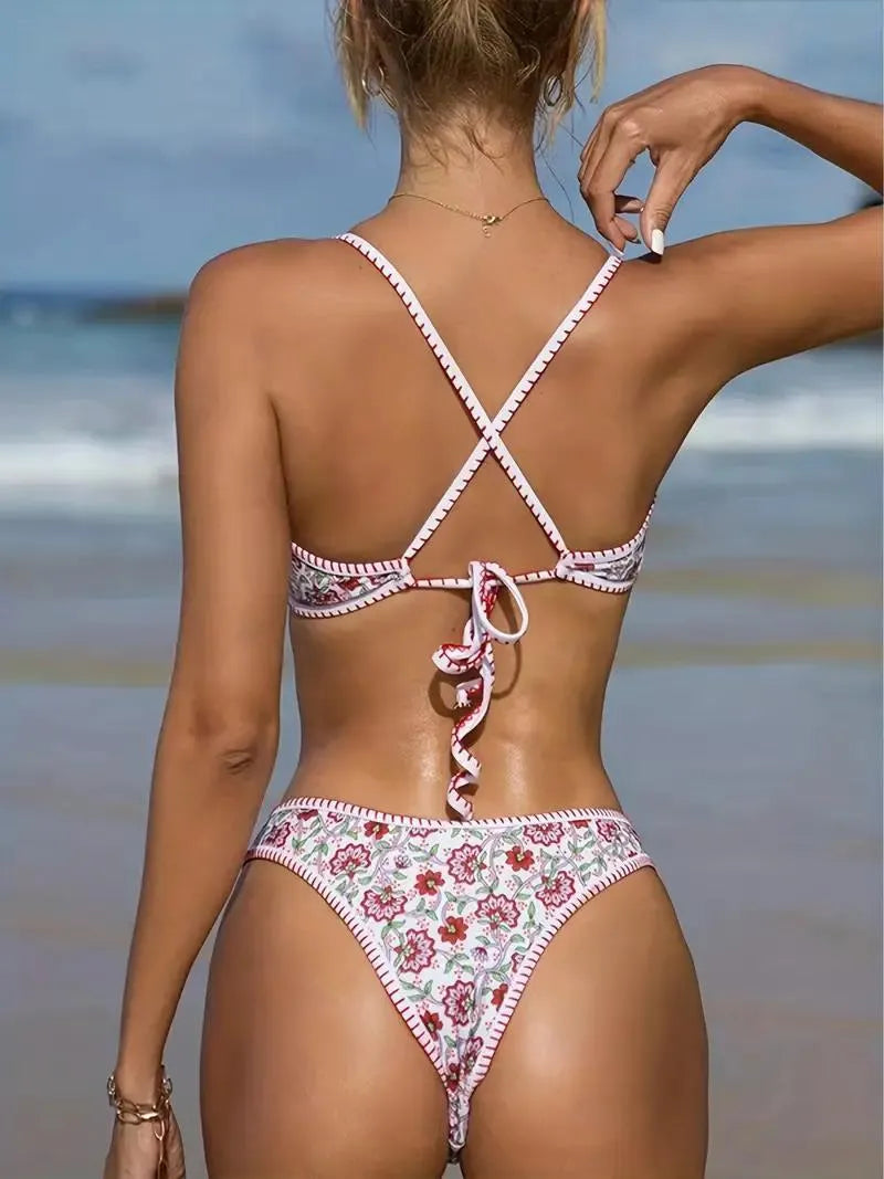 V-neck swimsuit with floral embroidery and printed patterns in brief cut design