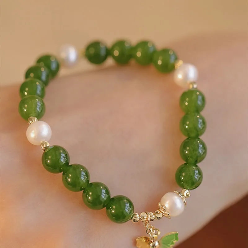 Women's natural green chalcedony bracelet with geometric design and round elements
