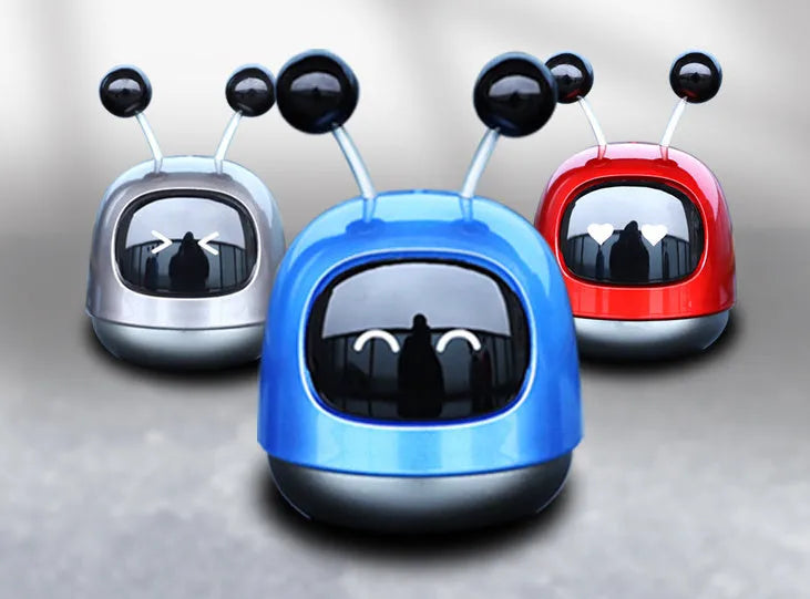 Colourful robot-shaped car vent clip aromatherapy diffuser with 40ml gel capacity.