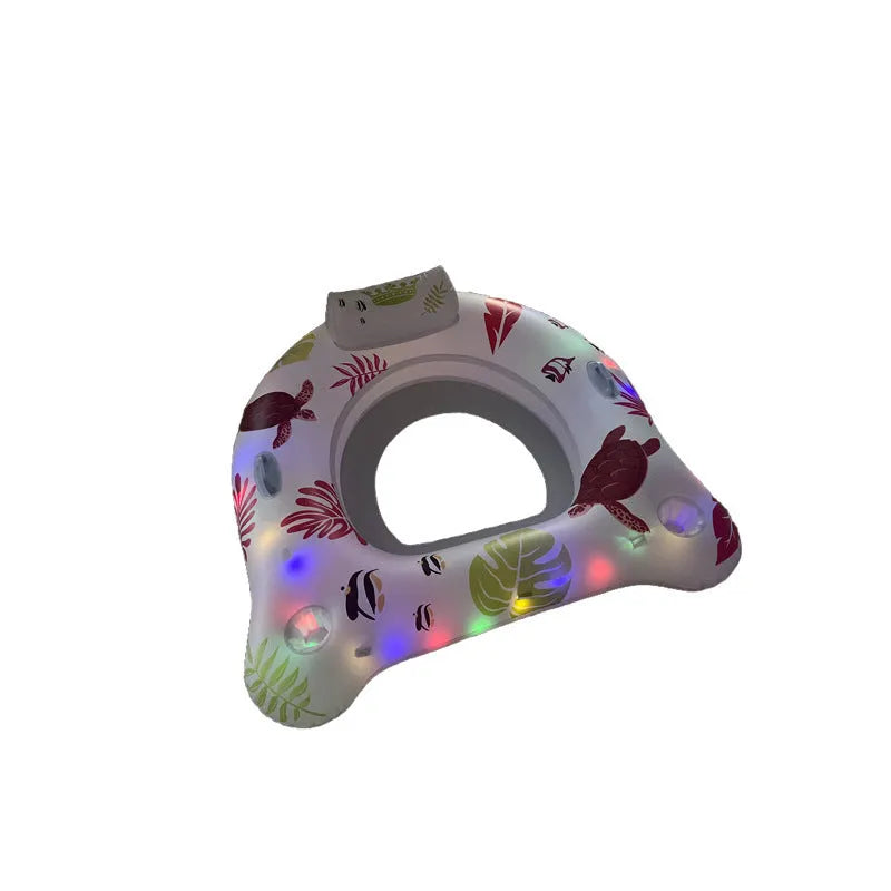 White luminous U-shaped inflatable float on water, showing recliner seat design.