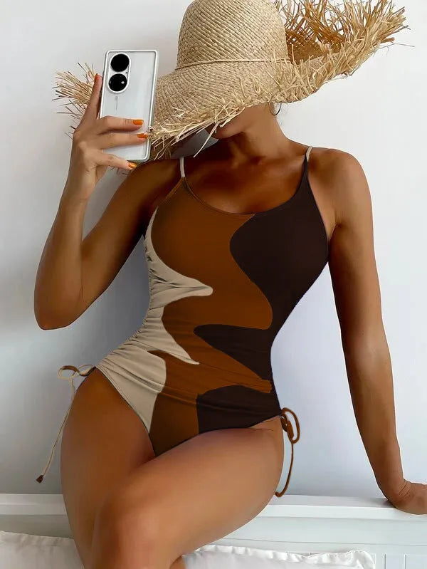 Women's blue one-piece sleeveless swimsuit with a backless design for swimming sports.