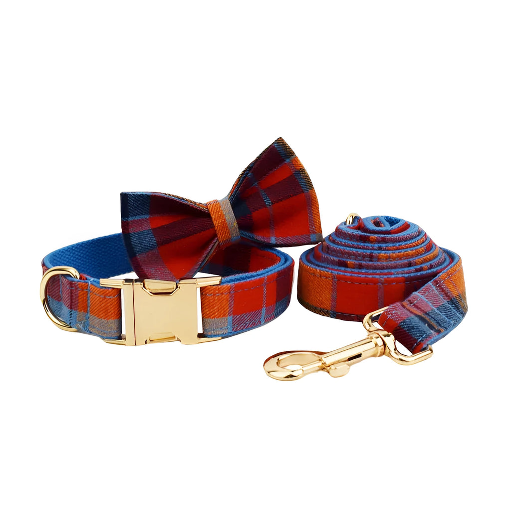 Blue velvet plaid cloth dog collar and matching leash set on a neutral background