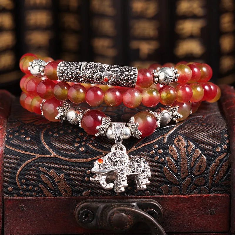 Watermelon crystal Chinese knot bracelet showing traditional design and natural crystal material