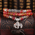 Watermelon crystal Chinese knot bracelet showing traditional design and natural crystal material