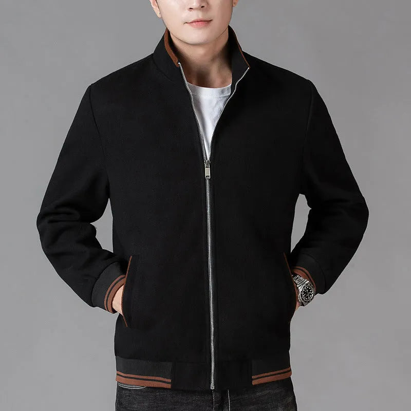 A grey men's sports-style fleece jacket with a stick pocket and long sleeves.
