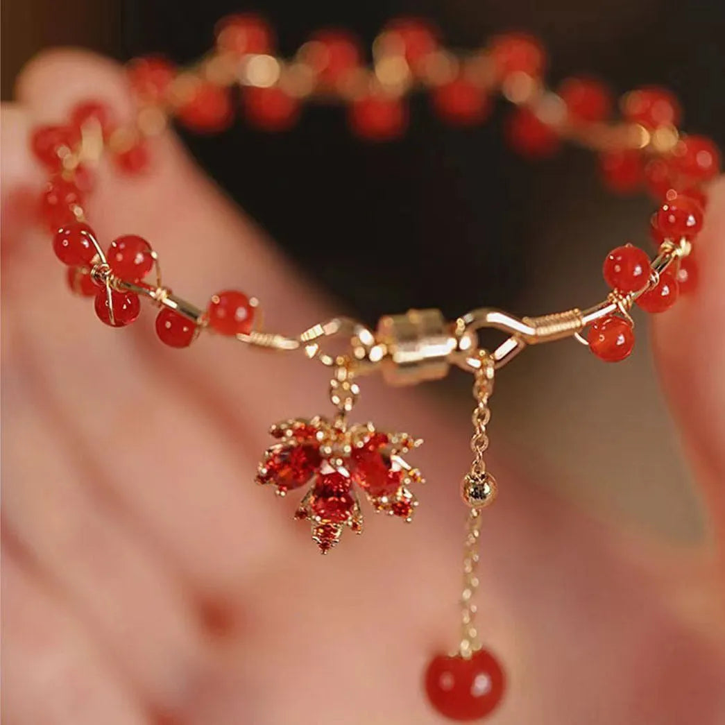 Red Chinese style magnetic bracelet with ginkgo leaf design and electroplated finish