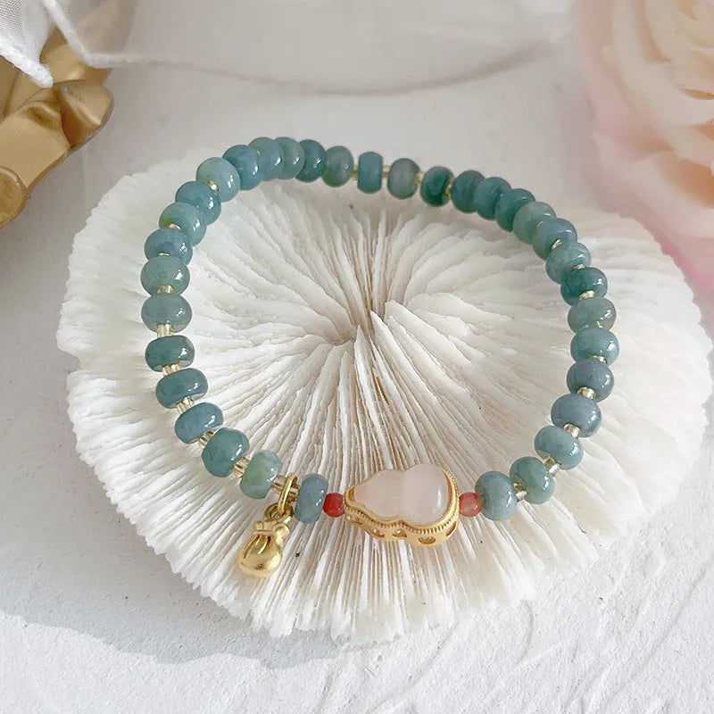 Simple jade gourd bead bracelet with fu character peace buckle in natural blue water colour