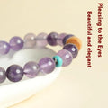 Purple amethyst crystal lucky bracelet for women on a white background.