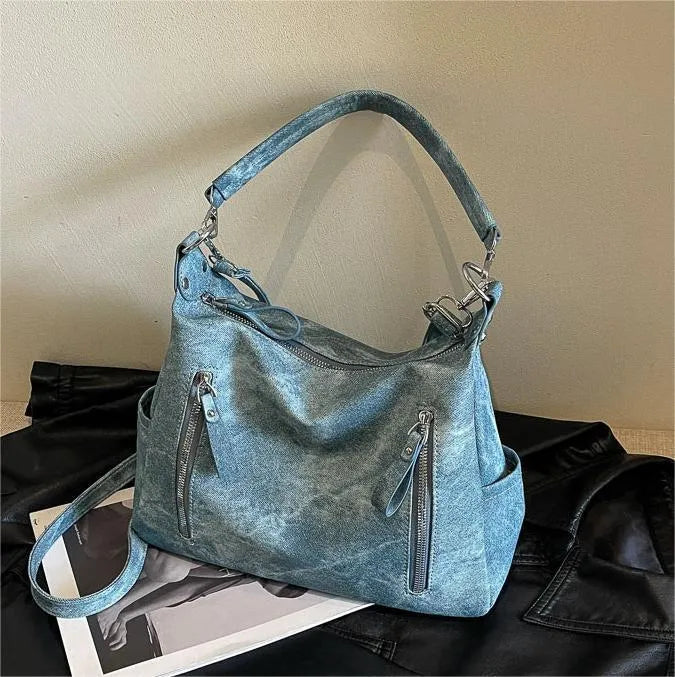 Large capacity women's casual shoulder bag in PU with sewing thread detail, available in denim blue, khaki, dark brown, light blue