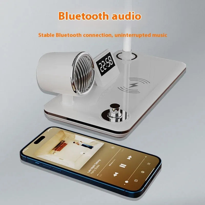 Black desk lamp with wireless charging pad, digital clock display, and adjustable lighting